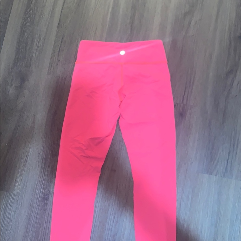 Bright pink lulu leggings size 4